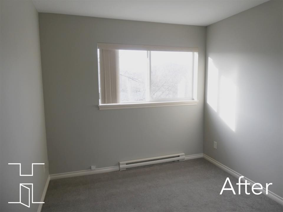 Bedroom after painting, in a soft neutral grey